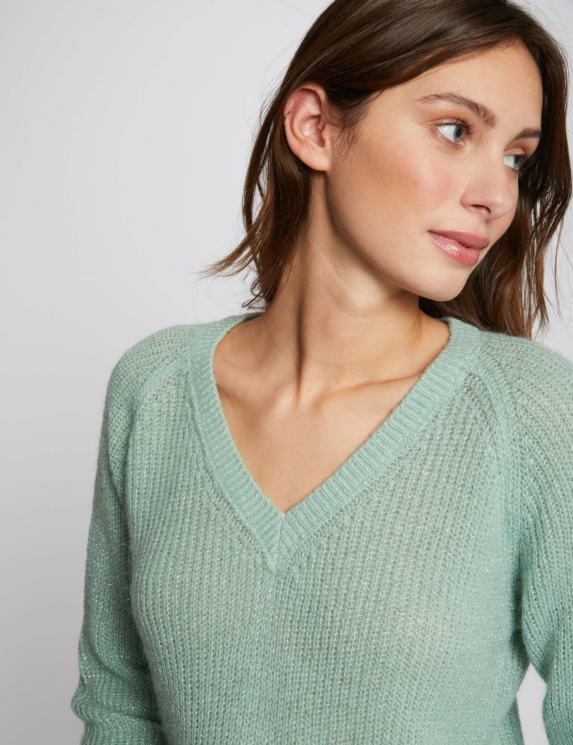 Pull vert clair femme sale